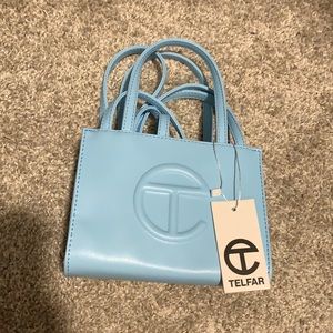 Small, blue, telfar bag